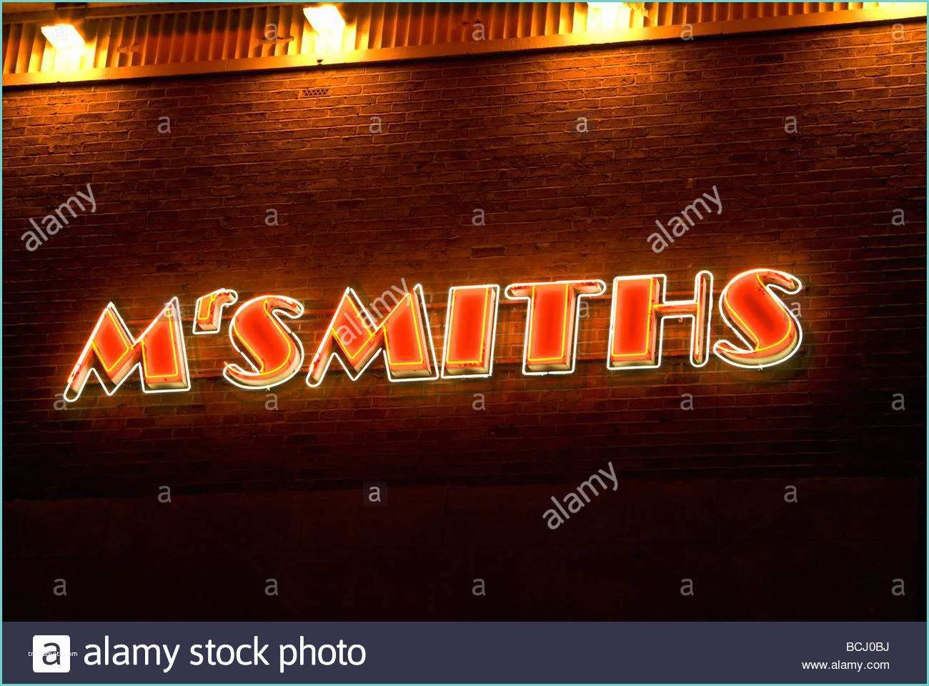 Neon Light Signs Warrington Art Deco Neon Sign On Side Of Building Mr Smiths