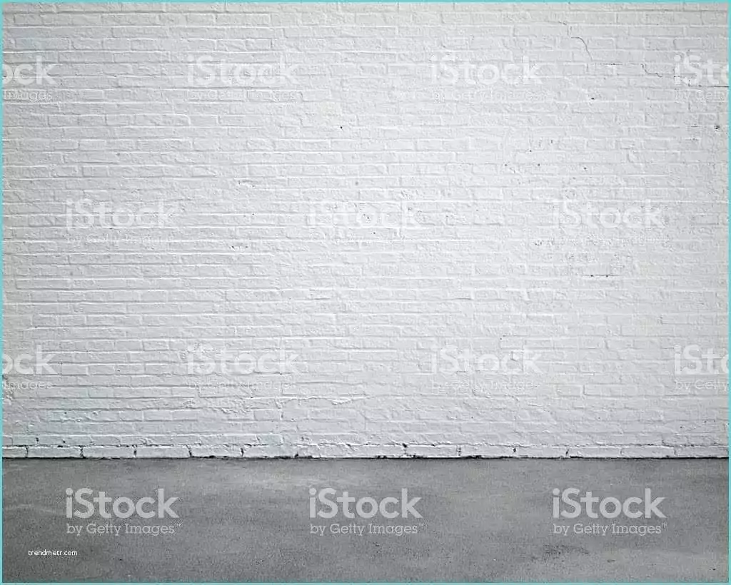 White Brick Wall and Floor Room Interior with White Brick Wall and Concrete Floor