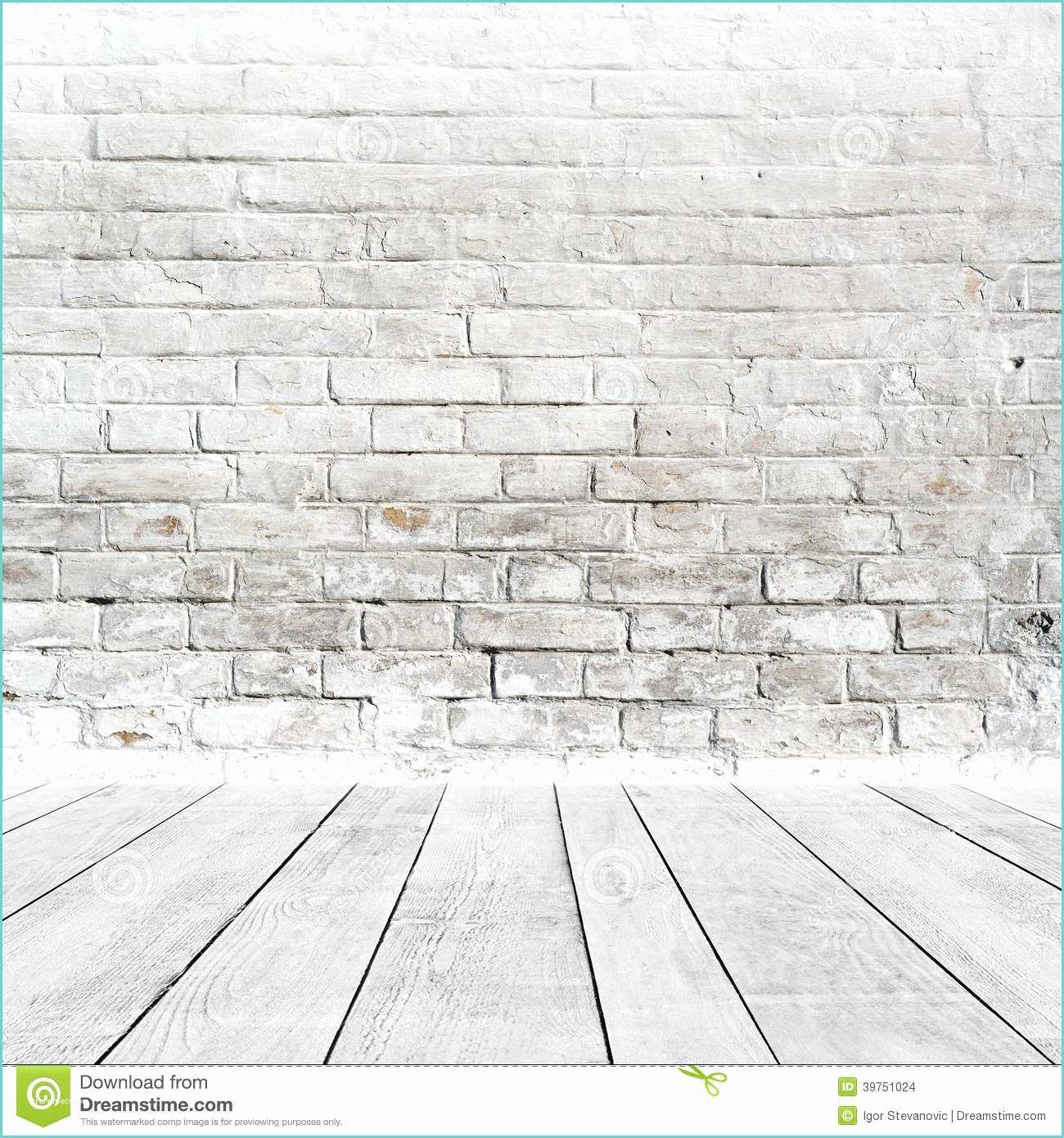 White Brick Wall and Floor Room Interior with White Brick Wall and Wood Floor Stock