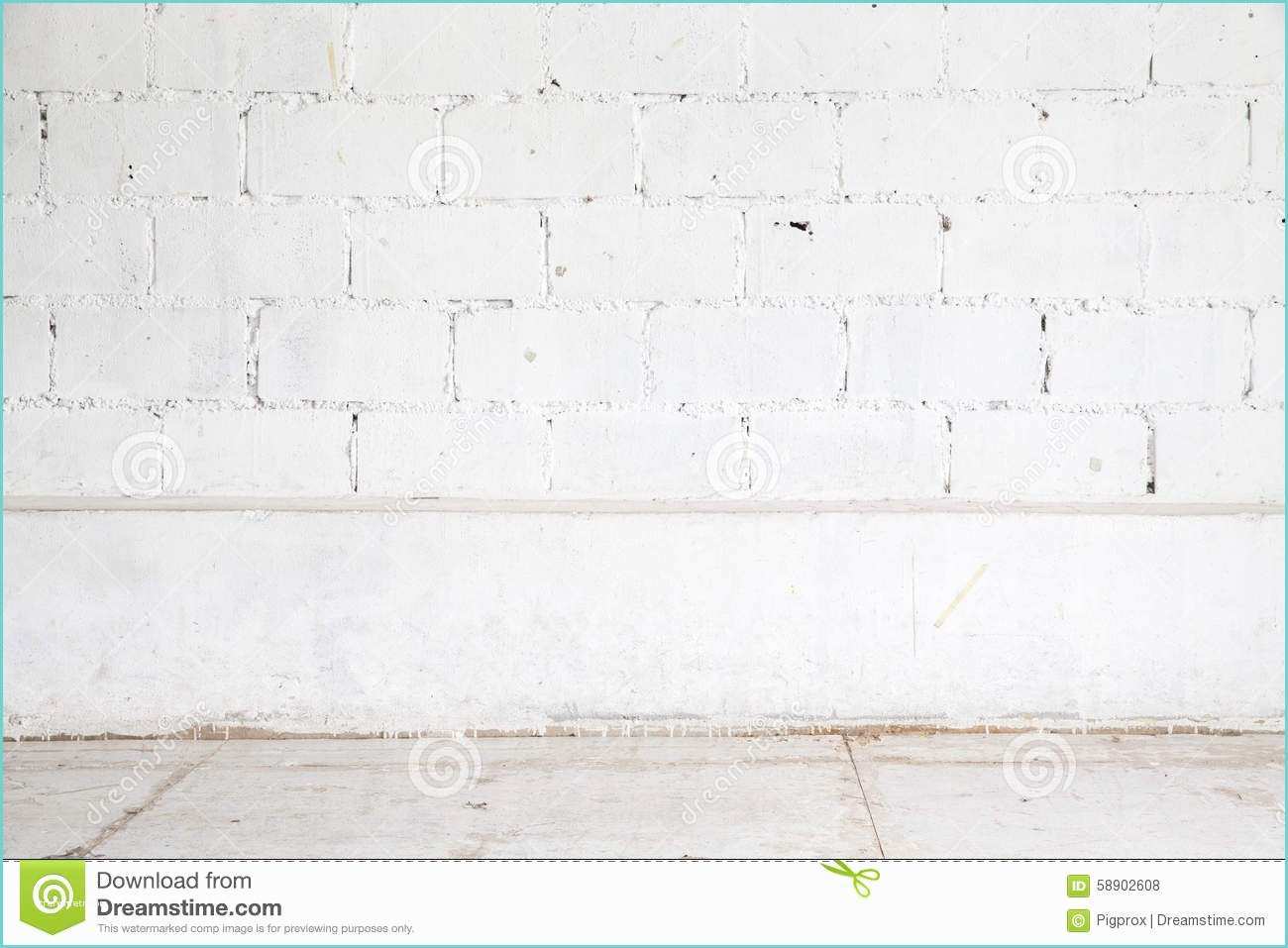 White Brick Wall and Floor White Brick Wall and Wood Floor Background Stock