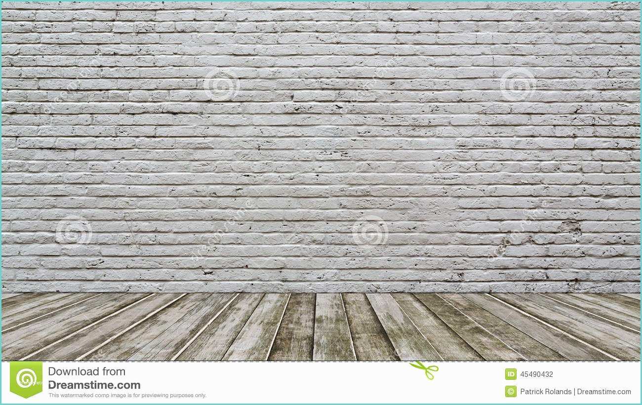 White Brick Wall and Floor White Brick Wall and Wood Floor Stock Image