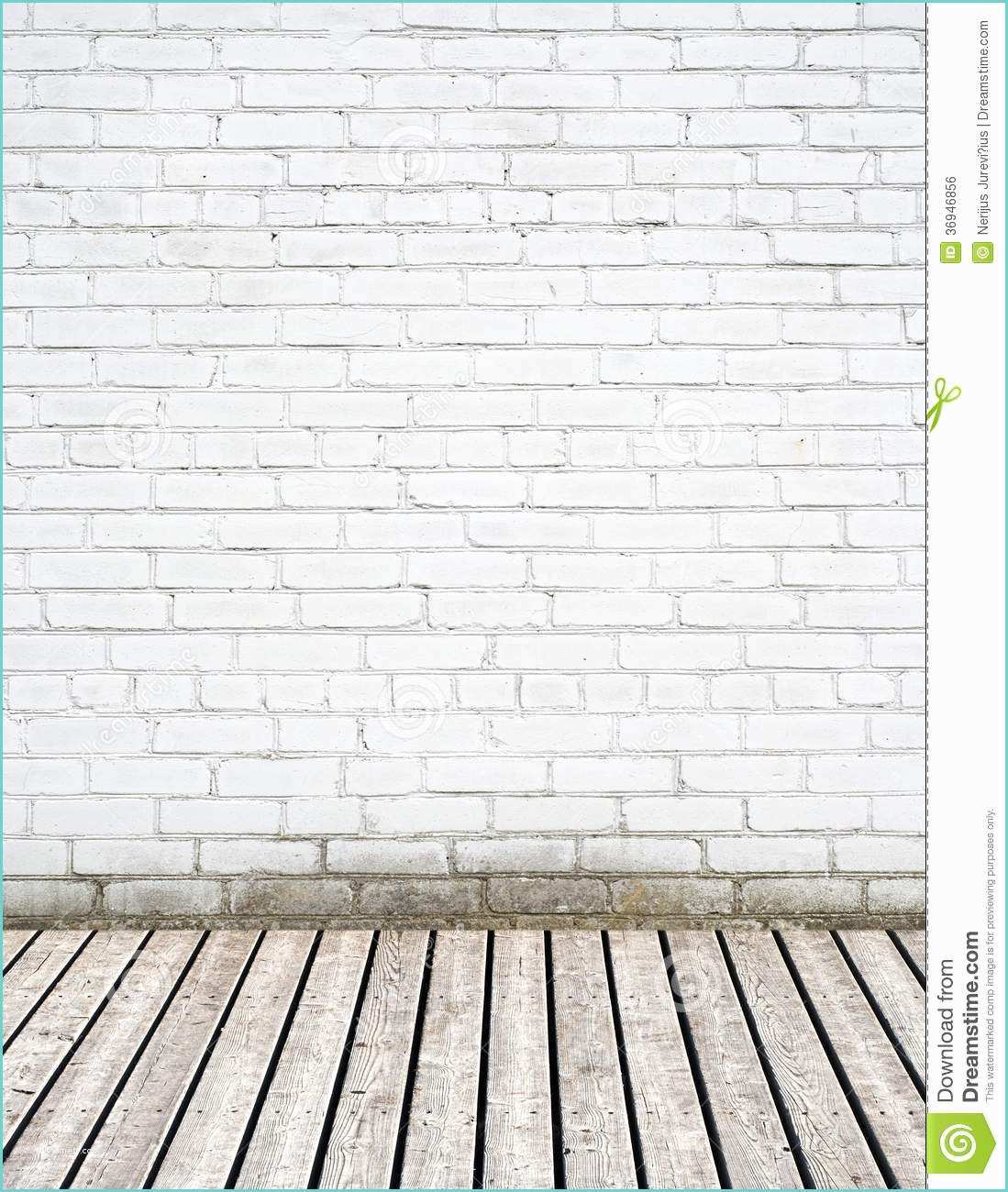 White Brick Wall and Floor White Brick Wall and Wooden Floor Stock Image